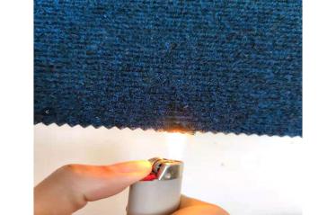 What materials are generally used for flame retardant wall coverings?